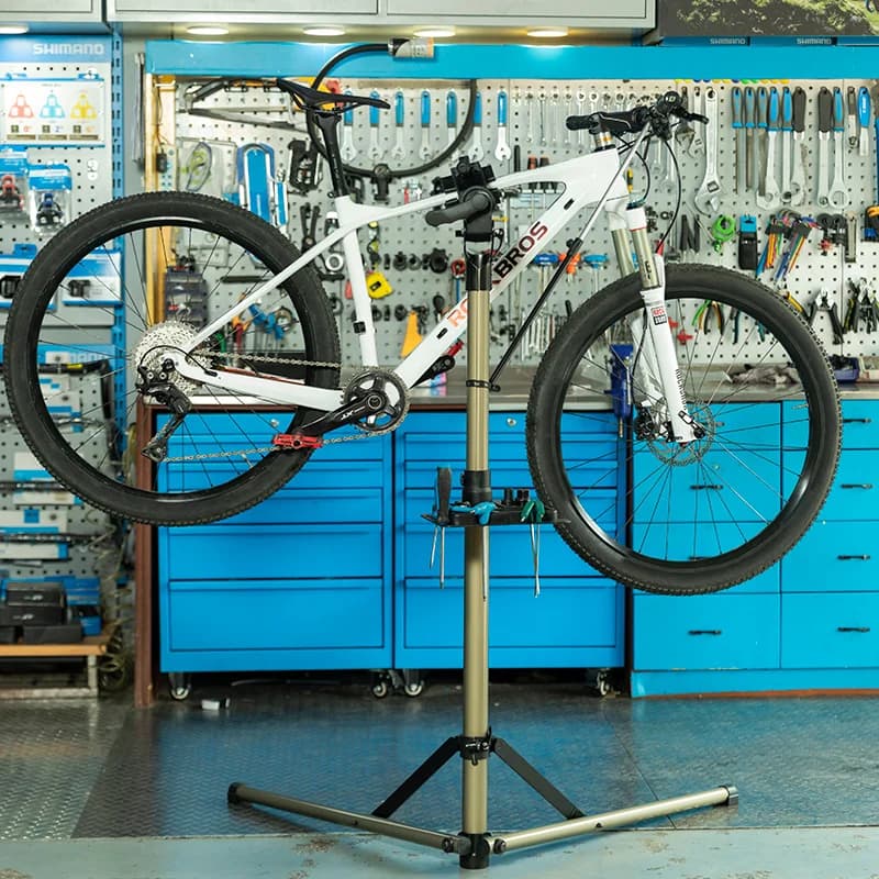 Soporte de reparación de bicicletas plegable con bandeja para herramientas